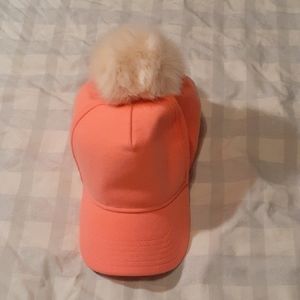 Peach pom pom hat